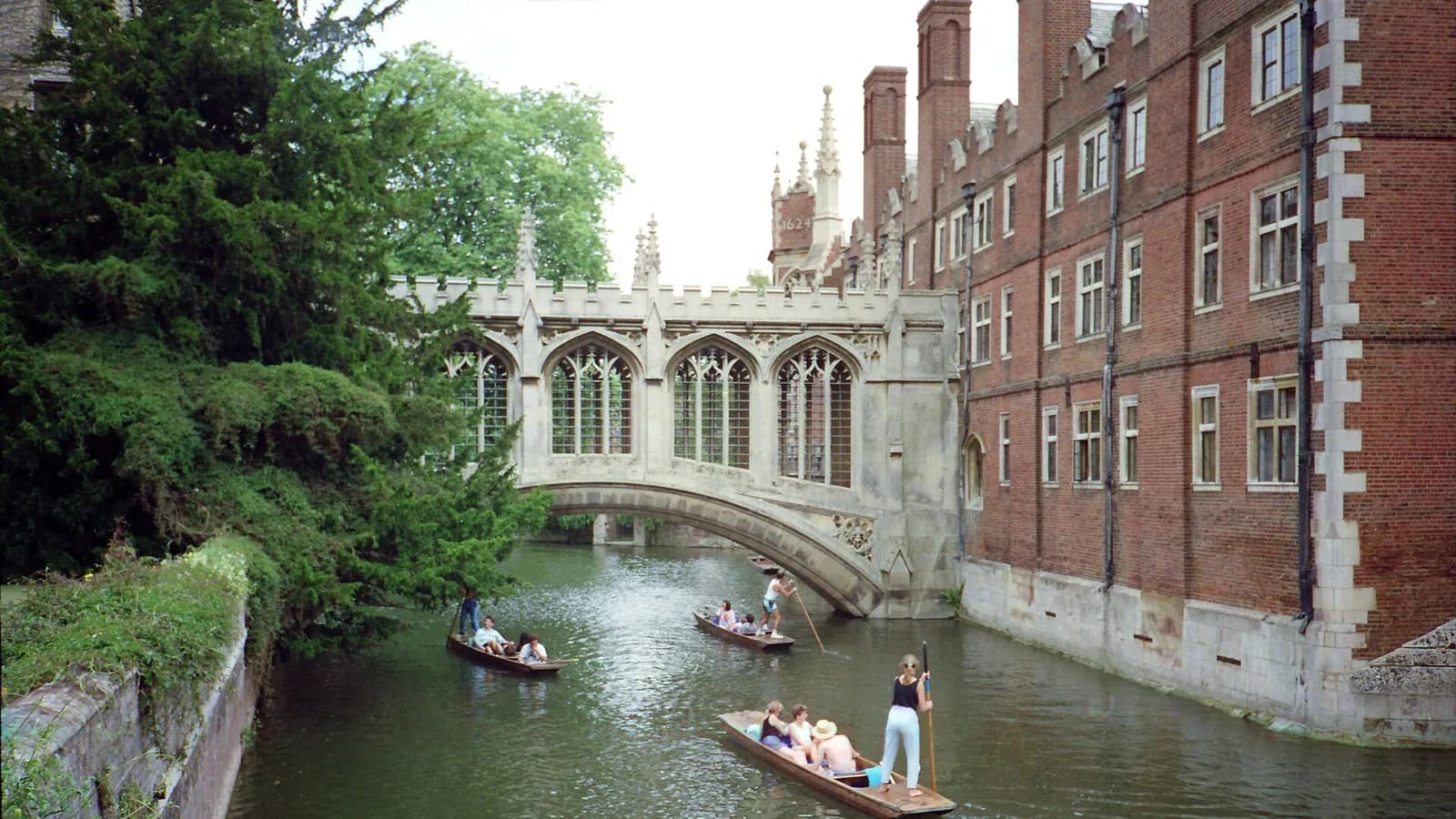 The Bridge of Sighs over the River Cam at St John’s College, Cambridge, with punts passing beneath