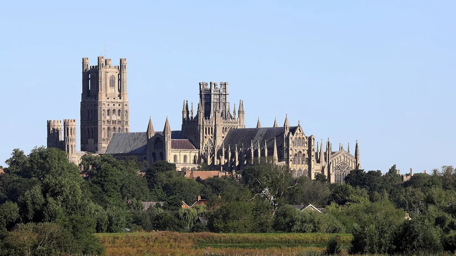Ely Cathedral rising above the Cambridgeshire fenland, viewed from across the fields